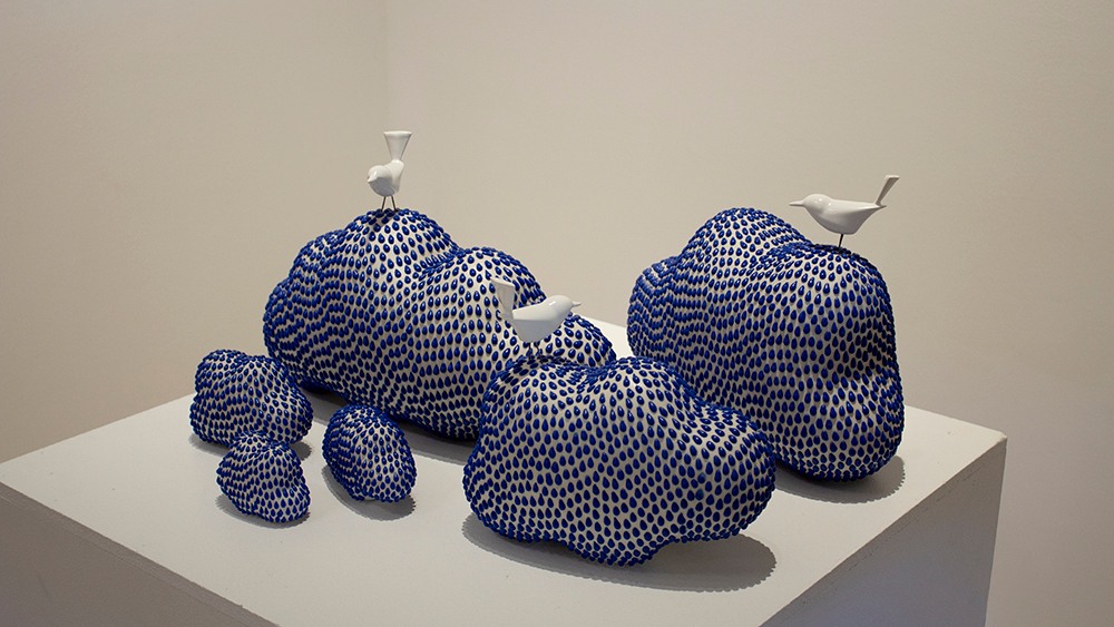 A sculpture of birds and clouds, part of the faculty exhibition at the Prichard Art Gallery.