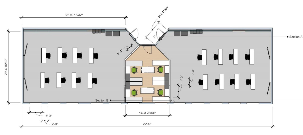 A floor plan showing desks and chairs arranged in a long narrow room.
