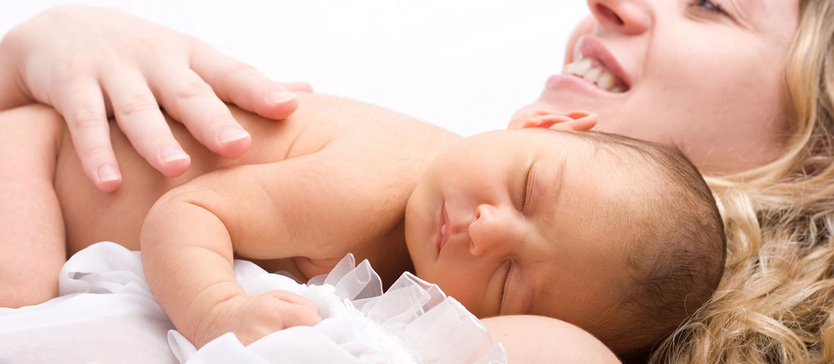 A woman with an infant.