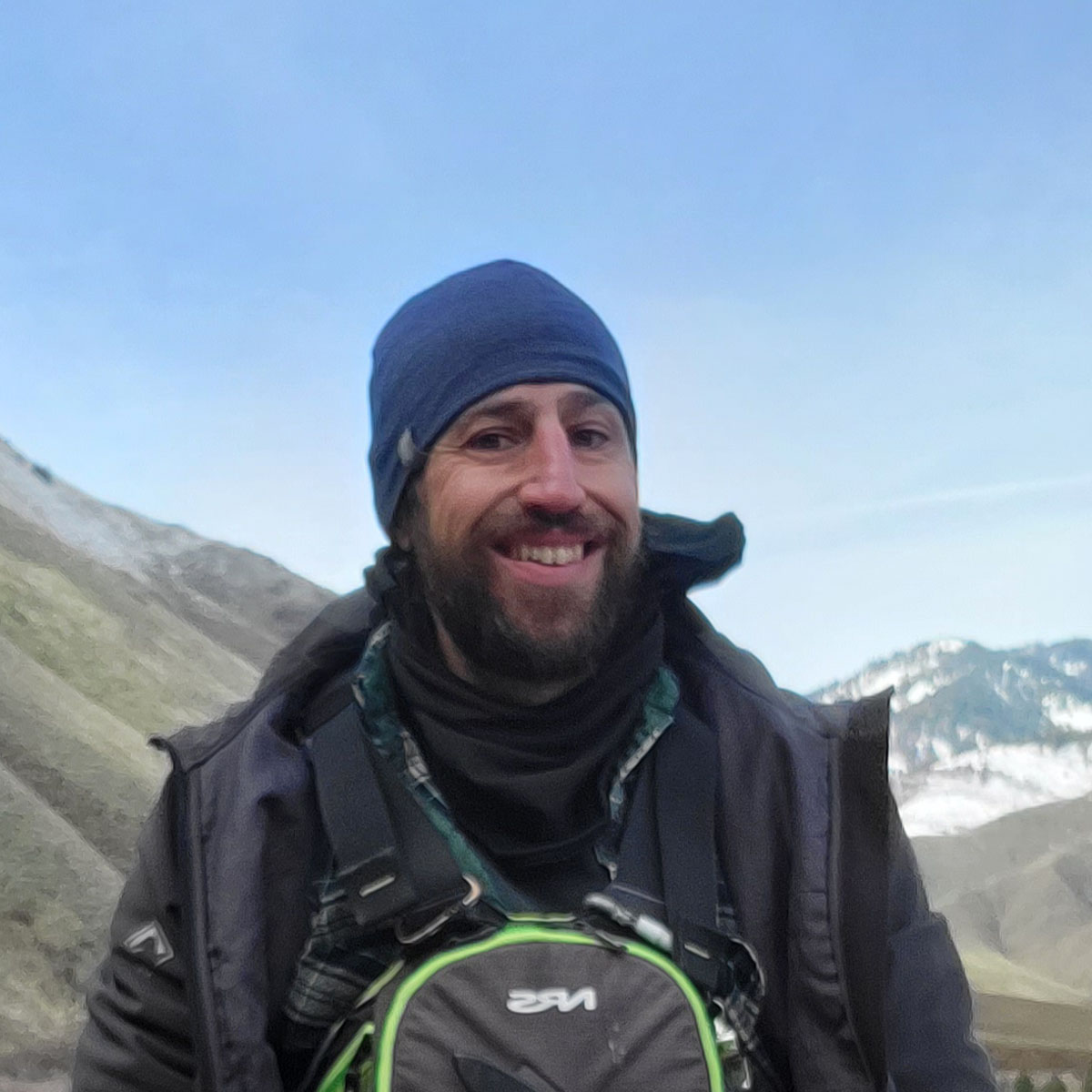 An outdoor portrait of Adam Schmoeger.