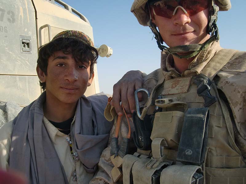 SSgt Michael Clark with a teenage boy