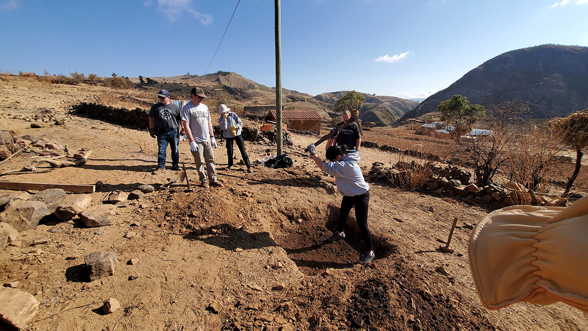 Students building latrines.