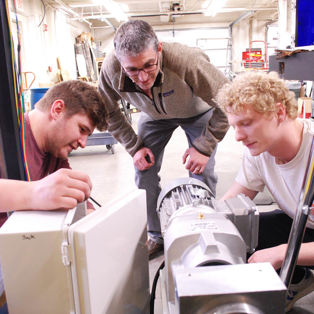 ME Grad Students Robert Carne and Conal Thie, ME faculty advisor Michael Maughan