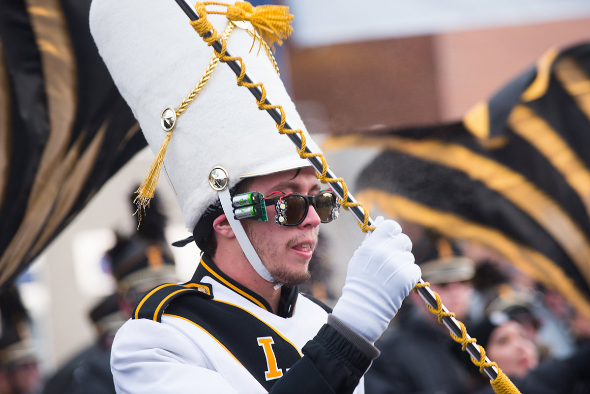 University of Idaho band member wielding baton