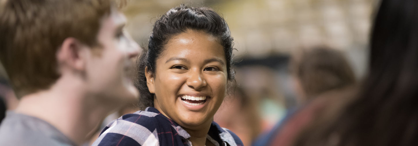 Girl smiling in the Kibbie Dome