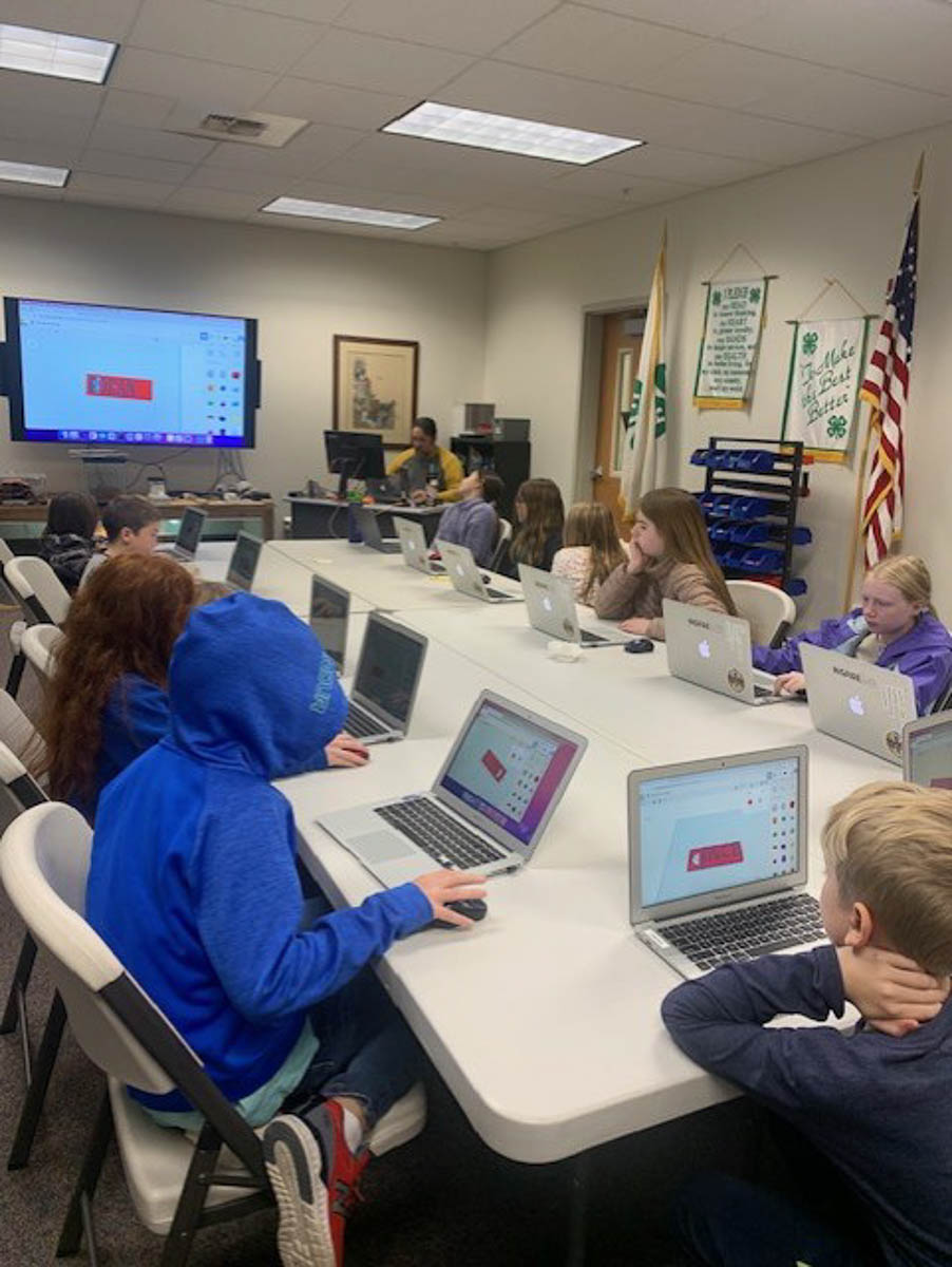 Youth participate in a 3-D printing class