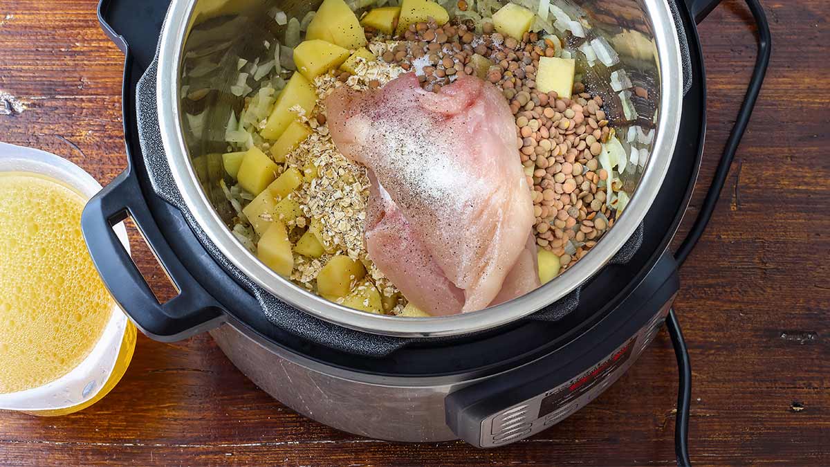 A pressure cooker full of food.