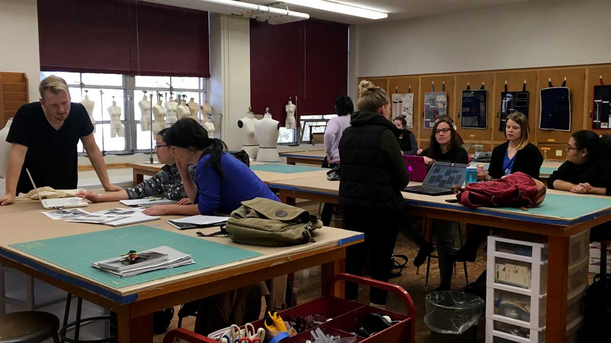 Students working in clothing lab
