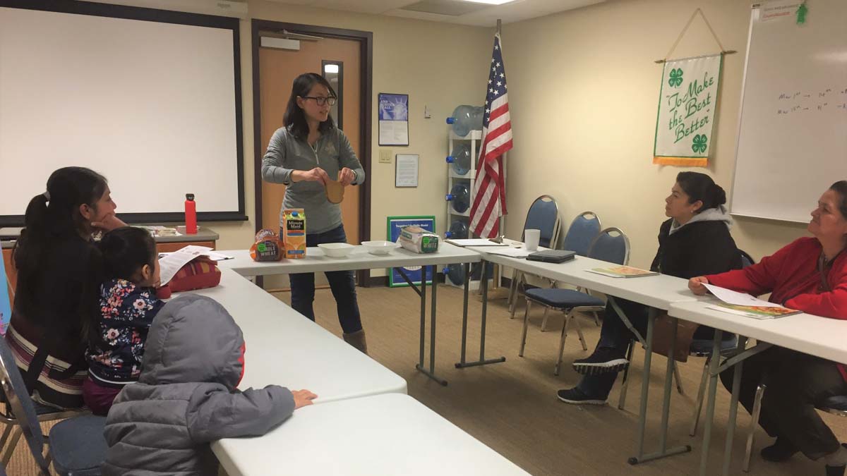 Woman presenting to women in children