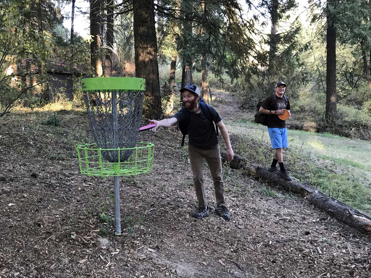 Students putt on the Duthie Park course in Troy.