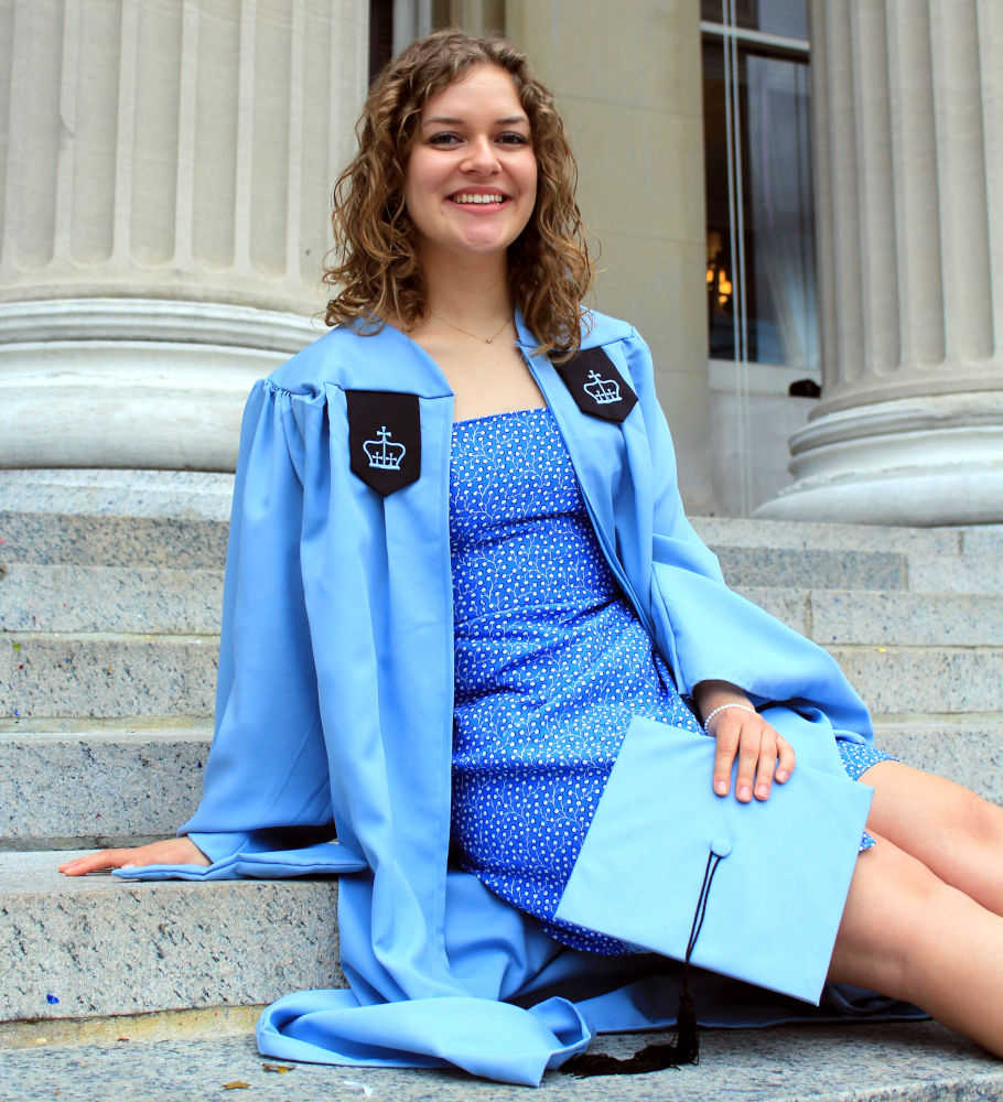 Woman on school steps.