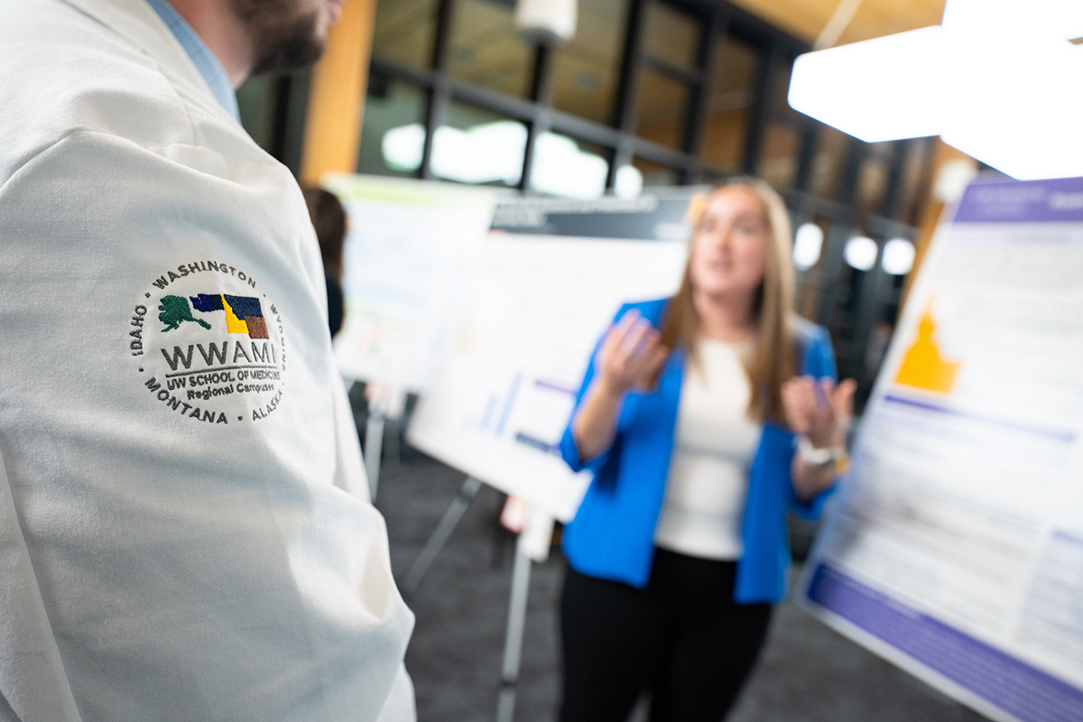 Zoomed in photo of WWAMI white coat logo