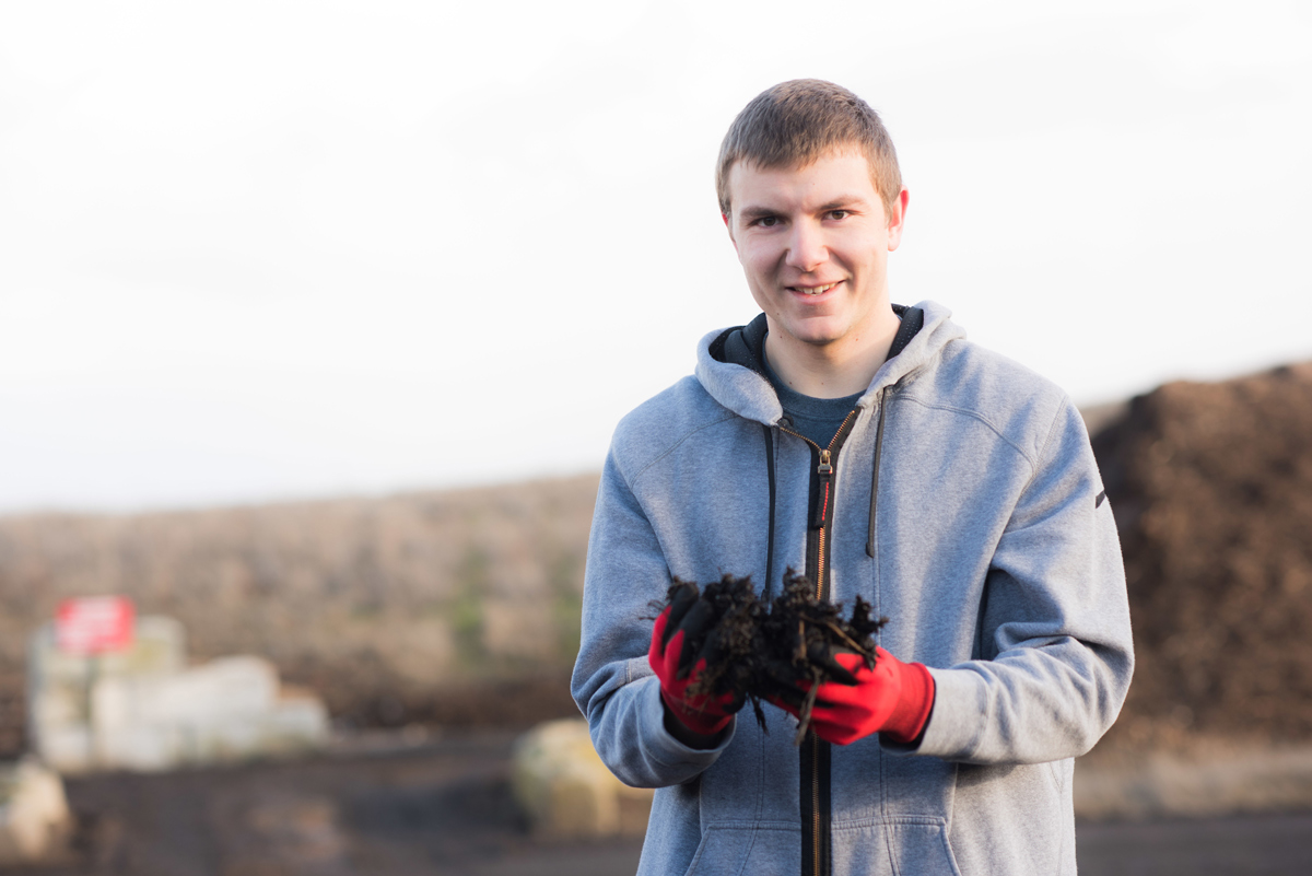 Kenny Sheffler holds bio waste.