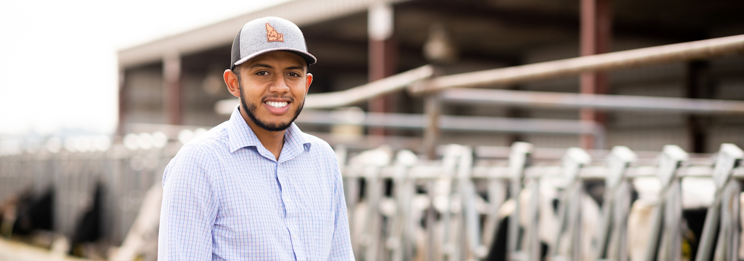Avelardo Vargas stands in front of a cow pen