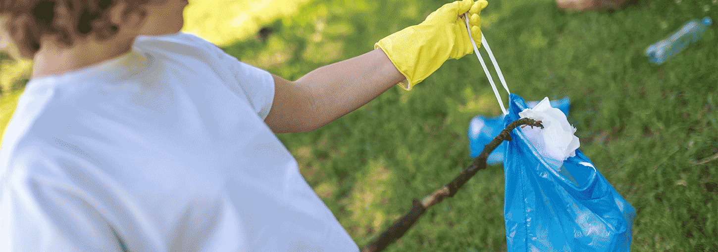 Students pick up trash and recycling on campus.